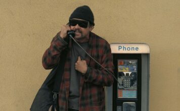 Leonardo DiCaprio as Bob Ferguson in One Battle After Another, directed by Paul Thomas Anderson. Copyright: Warner Bros. Pictures. All Rights Reserved.